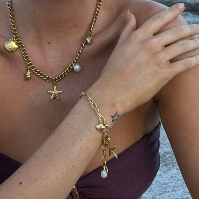 Gold plated rope chain charm bracelet with starfish, freshwater pearl and seashell charms — Bye Bye Baby