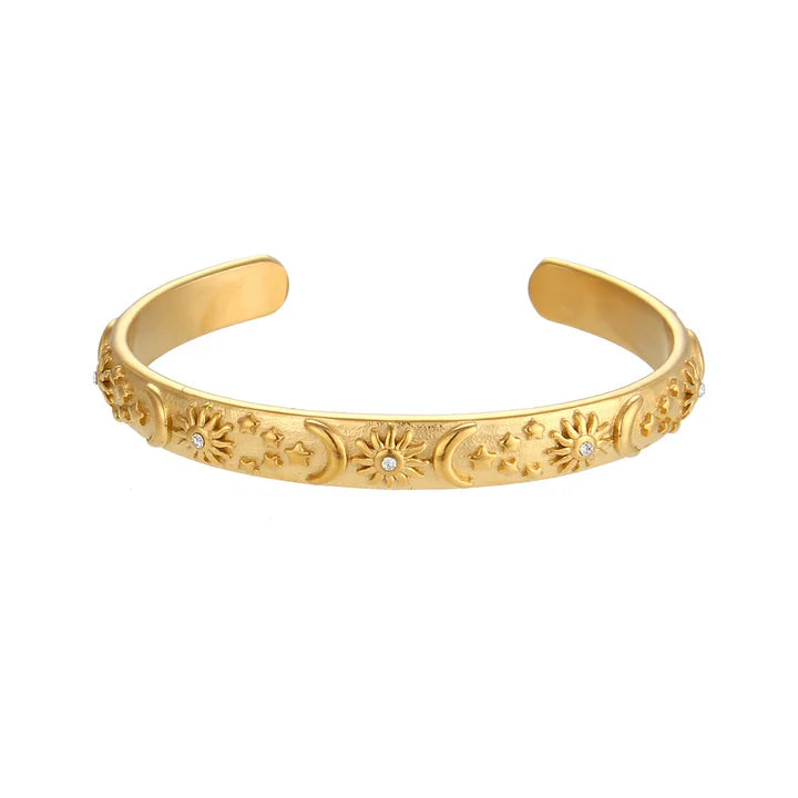 Gold plated medium width open cuff bracelet with star, moon and zirconia sun detail — Bye Bye Baby