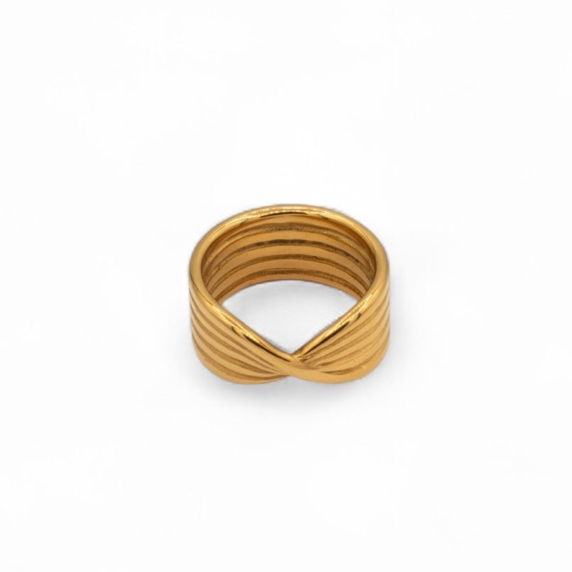 Gold plated sculptural band ring with sand-line curves and centre twist — Bye Bye Baby