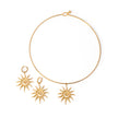 Gold necklace with sun-shaped pendants on a white background