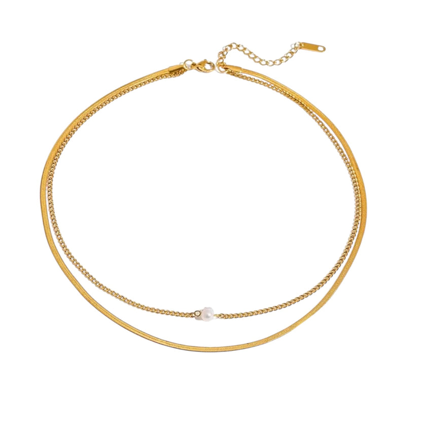Gold necklace with a pearl pendant on a white background